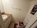 Cozy bathroom with a vanity, toilet, and decorative accents at 2200 Comet Ave # D, North Las Vegas, NV 89030