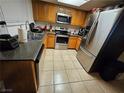 Functional kitchen features stainless steel appliances and ample cabinet space at 2200 Comet Ave # D, North Las Vegas, NV 89030