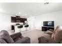 Open concept living room featuring bright spaces and direct access to a modern kitchen at 2495 Sunflower Days Ave # 2052, North Las Vegas, NV 89031