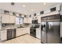Modern kitchen with stainless steel appliances, granite countertops, and ample cabinet space at 2725 S Nellis Blvd # 2084, Las Vegas, NV 89121