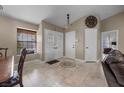An elegant foyer features tile flooring and decorative accents, creating a welcoming entrance at 5020 Linkside Dr, Las Vegas, NV 89130
