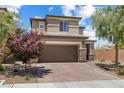 Charming two-story home featuring a two-car garage and nicely landscaped front yard with mature trees at 6783 Pleasant Flower St, Las Vegas, NV 89149