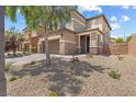 Charming two-story home featuring a two-car garage and low maintenance landscaping at 6783 Pleasant Flower St, Las Vegas, NV 89149