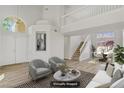 This is a virtually staged home with high ceilings, and an open floor plan at 7813 Paper Flower Ct, Las Vegas, NV 89128