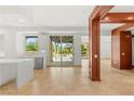 Bright living space with large sliding glass doors leading to an outdoor patio at 9101 Alta Dr # 102, Las Vegas, NV 89145