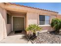 Close up on the front door of a home with desert landscaping at 945 Stetson Dr, Henderson, NV 89002