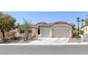 Attractive single-story home with a tile roof, two-car garage, and desert-style landscaping at 10113 Plomosa Pl, Las Vegas, NV 89134