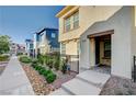 Street view of a modern home with a well-maintained front yard and sidewalk at 1131 Ruby Sparrow St, Henderson, NV 89011