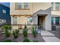 Charming home featuring a small, fenced front yard with drought resistant landscaping at 1131 Ruby Sparrow St, Henderson, NV 89011