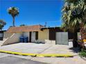 Exterior shot showing the driveway and entrance to the home with desert landscaping at 2773 Heritage Ct, Las Vegas, NV 89121