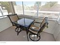 Cozy patio area with comfortable seating, perfect for enjoying outdoor relaxation and dining at 5710 E Tropicana Ave # 2178, Las Vegas, NV 89122