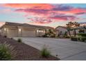 Charming single-story home with a spacious driveway and desert landscaping at 835 Market Crest Dr, Las Vegas, NV 89110