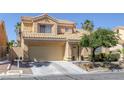 Charming two-story home with a neutral stucco exterior and a well-maintained front yard at 9428 Sierra Summit Ave, Las Vegas, NV 89134