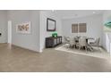Elegant dining room with modern furnishings and neutral decor at 164 Cabo Cruces Dr, Henderson, NV 89011