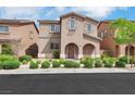 Inviting two-story house with a well-maintained lawn and covered entry at 1976 Galleria Spada St, Henderson, NV 89044