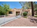 Single-story stucco home with desert landscaping and a walkway that leads to the front door at 2851 S Valley View Blvd # 1199, Las Vegas, NV 89102