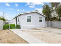 Cozy home with manicured landscaping, featuring a fresh exterior and a convenient driveway at 320 W Van Buren Ave, Las Vegas, NV 89106