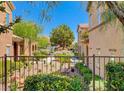 Townhomes with well-kept green spaces, offering a serene environment at 3820 Wiggins Bay St # 201, Las Vegas, NV 89129