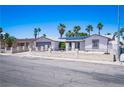 Street view showing a well-maintained home with desert landscaping and block wall for enhanced curb appeal at 4742 Monterrey Ave, Las Vegas, NV 89121