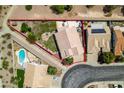 An aerial view shows the property outlined with a pool and well-maintained landscaping at 1017 Guided Dancer Ave, Henderson, NV 89015