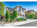Beautiful two-story home features a two-car garage and well-maintained landscaping in a desirable location at 10749 Turquoise Valley Dr, Las Vegas, NV 89144