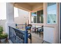 Relaxing front porch featuring comfortable seating and views of the neighborhood at 10749 Turquoise Valley Dr, Las Vegas, NV 89144