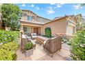 Inviting outdoor patio with stylish seating, creating a perfect space for relaxation and entertaining at 1134 Pandora Canyon St, Henderson, NV 89052
