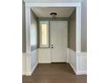 Inviting entryway featuring a front door and tiled floor at 1921 Moonlight Bluff Ave, North Las Vegas, NV 89084