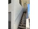 Condo exterior with staircase leading up to a private entrance, offering a convenient access point at 2212 Sunfish Dr # D, Henderson, NV 89014