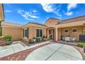Private courtyard features a brick-laid patio, perfect for outdoor dining and relaxation at 2365 Wisconsin Dells Dr, Henderson, NV 89044