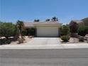 Charming single-story home features a well-manicured front yard with lush greenery, set back from a quiet street at 2537 Terrytown Ave, Henderson, NV 89052