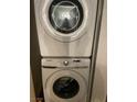 Modern laundry area includes a stackable washer and dryer, optimizing space and convenience at 3150 Soft Breezes Dr # 1033, Las Vegas, NV 89128