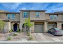Charming townhouse with a private entrance, well-maintained landscaping, and a driveway at 5299 Silver Branch Ave, Las Vegas, NV 89118