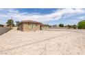 Wide shot of the exterior of the property with space for a yard at 6131 Rio Vista St, Las Vegas, NV 89130