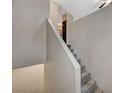Carpeted stairs leading upstairs, complemented by freshly painted walls at 8717 Red Brook Dr # 201, Las Vegas, NV 89128