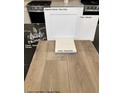 Image showcasing flooring, paint, cabinet, faucet and quartz samples for the home at 9246 Dekalb Ct, Las Vegas, NV 89148