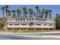 Lake Las Vegas community entrance sign with shopping, restaurant, and resort information at 161 Cabo Cruces Dr, Henderson, NV 89011