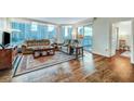Living room showcasing city views, comfortable seating, and balcony access at 222 Karen Ave # 601, Las Vegas, NV 89109