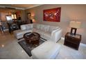 Open floorplan living room boasts a plush sofa, elegant decor, and a welcoming atmosphere at 270 E Flamingo Rd # 319, Las Vegas, NV 89169