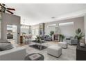 Inviting living room featuring a cozy fireplace, plush seating, and an open layout at 3112 Haddon Dr, Las Vegas, NV 89134