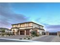 Beautiful two-story home with a spacious driveway and meticulously landscaped front yard at 5328 Hickory Tree St, Las Vegas, NV 89149