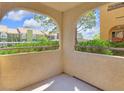 Private balcony showcasing lush green landscape at 7950 W Flamingo Rd # 1077, Las Vegas, NV 89147