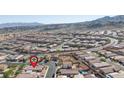 Panoramic aerial view of a well-planned community nestled against a mountain backdrop at 2099 Port Royal Dr, Laughlin, NV 89029