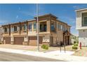 Lovely townhouse with stone accents, individual garages, and private balconies at 216 Callen Falls Ave # 1423, Henderson, NV 89011