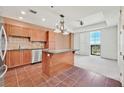Bright kitchen with stainless steel appliances and granite countertops at 2455 W Serene Ave # 851, Las Vegas, NV 89123