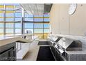Modern outdoor kitchen equipped with stainless steel grill and ample counter space against an urban backdrop at 3722 Las Vegas Blvd # 603, Las Vegas, NV 89158