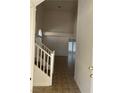 Entryway features tile floors and a staircase leading to the second floor at 7228 Chic Ave, Las Vegas, NV 89129