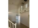 Spacious living room with tile floors and lots of natural light at 7228 Chic Ave, Las Vegas, NV 89129