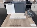 Upgraded kitchen finish samples featuring cabinets, paint, a quartz countertop and a stylish faucet at 9082 Rivington Ave, Las Vegas, NV 89148