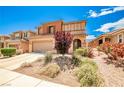 Charming two-story home featuring landscaped yard and neutral color palette at 9271 Martel Ave, Las Vegas, NV 89148